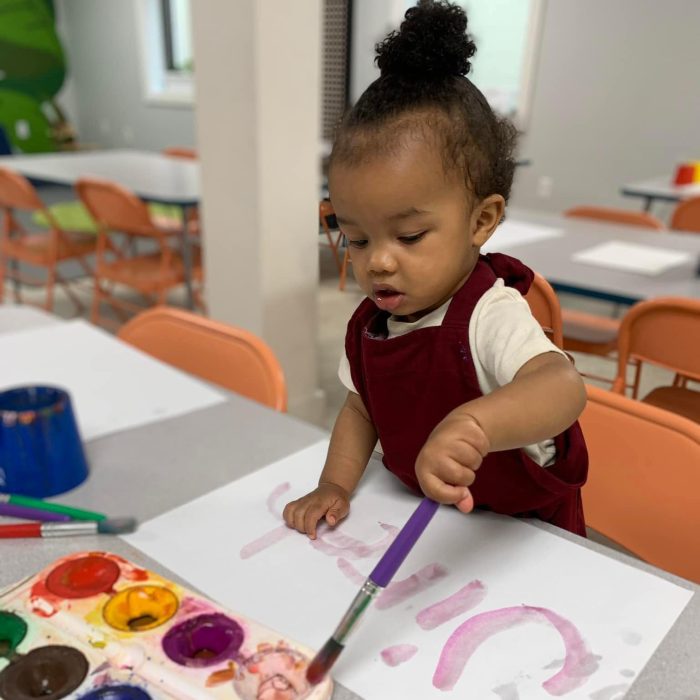 Small child painting at Art Center of the Bluegrass during Mini Makers Club, in Danville, Kentucky