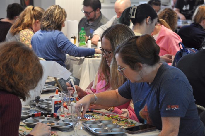 People making mosaics at the Art Center