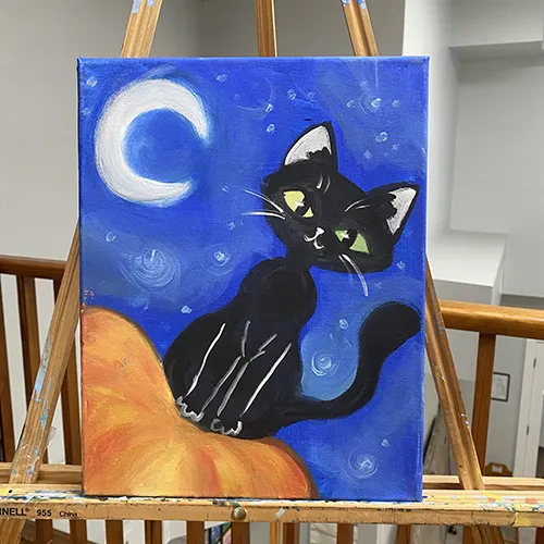 A painting of a cat on a pumpkin with a moon in the night sky